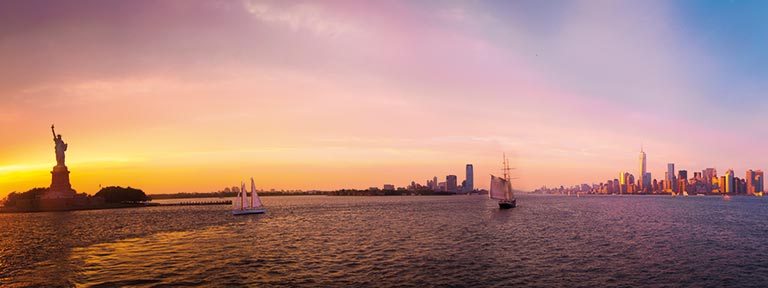 The New York City skyline with the Statue of Liberty in view